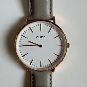 Light grey leather strap watch with rose gold face